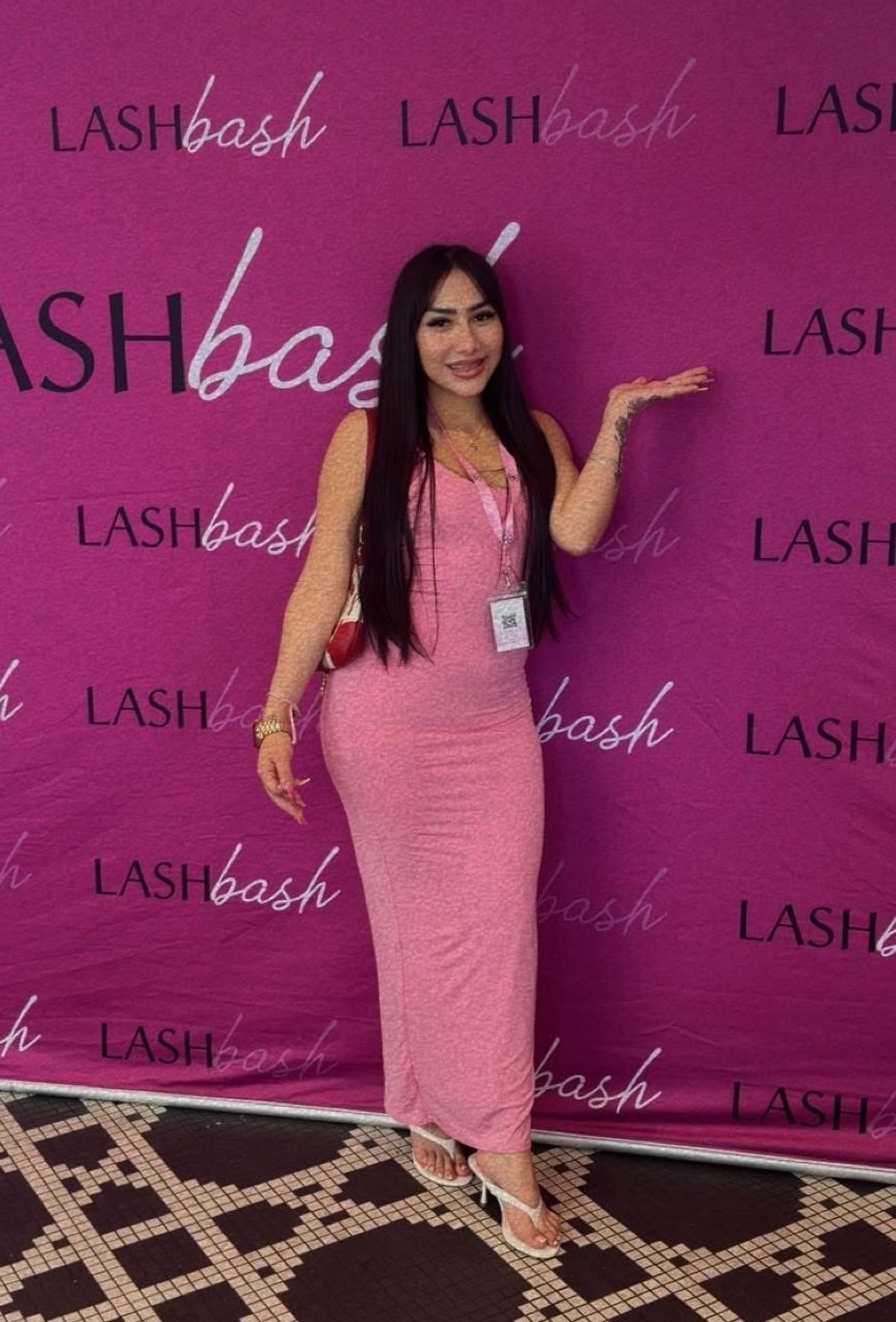 Michelle in a pink dress at the LashBash event